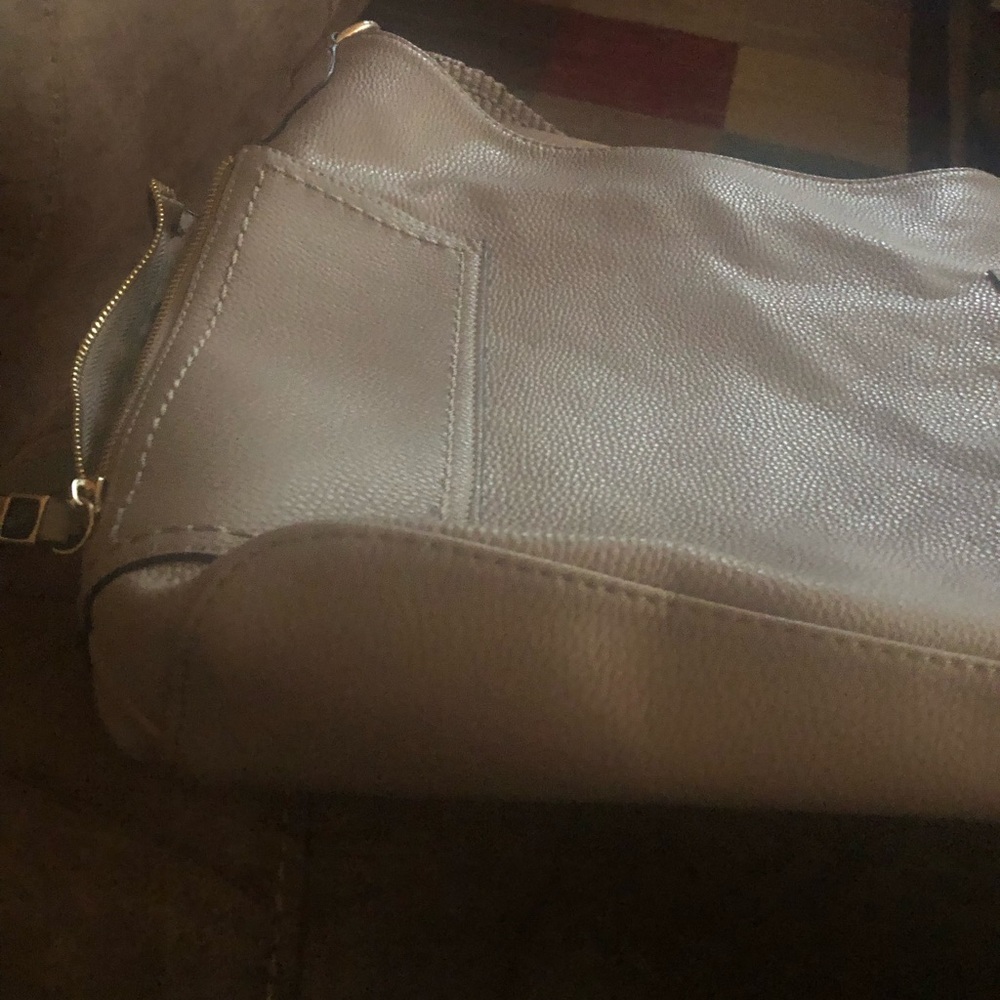 Madison West.  Jessica Simpson. Purses